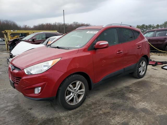 HYUNDAI TUCSON GLS 2013 with VIN KM8JUCAC0DU761771 - Photo from auction