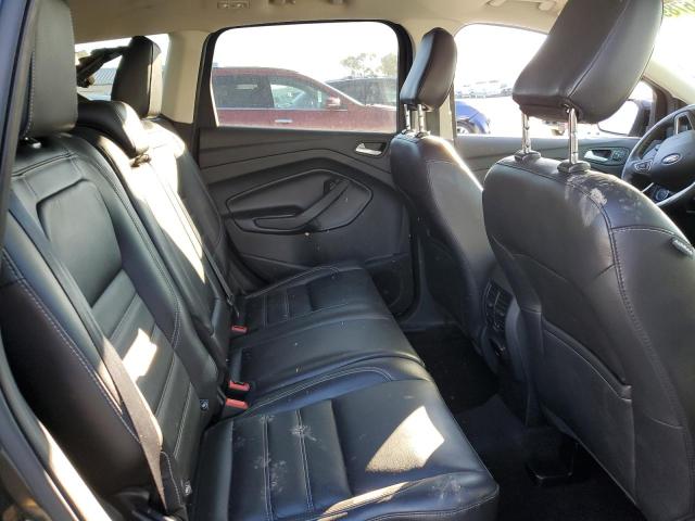 Photo 11 from auction – 2019 FORD ESCAPE TIT with VIN 1FMCU9J95KUB25604