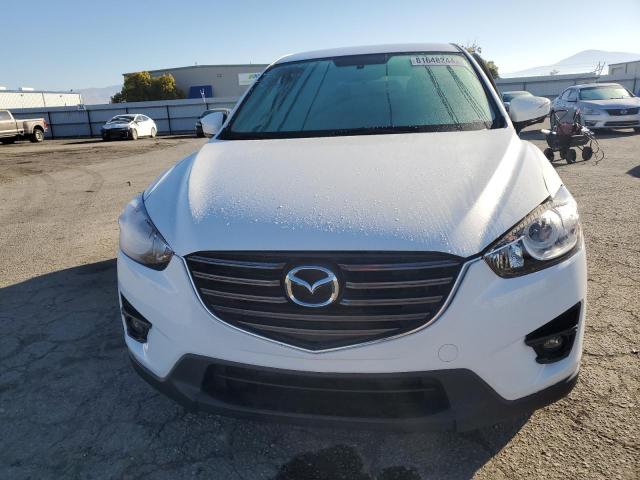 Photo 5 from auction – 2016 MAZDA CX-5 TOURI with VIN JM3KE2CY1G0689023
