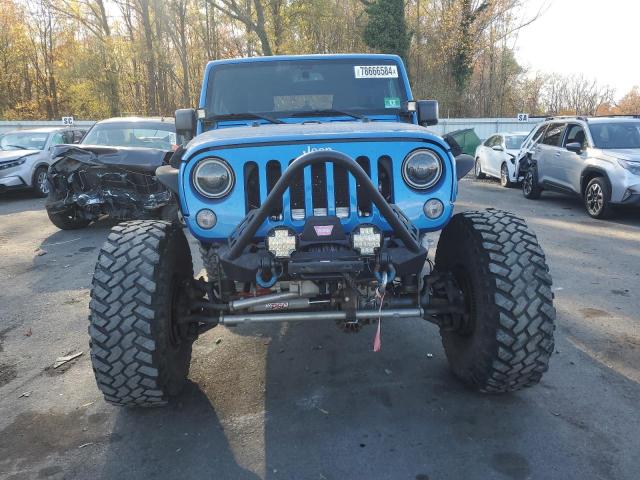 Photo 5 from auction – 2016 JEEP WRANGLER R with VIN 1C4BJWCG4GL276367
