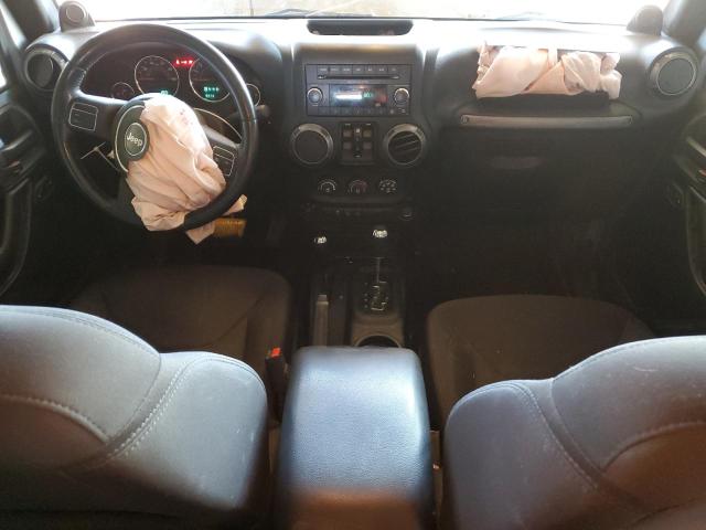 Photo 8 from auction – 2014 JEEP WRANGLER U with VIN 1C4BJWDG7EL308790