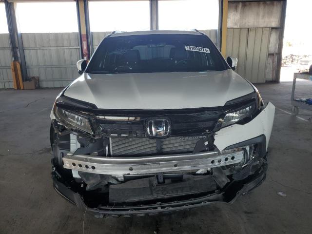 Photo 5 from auction – 2021 HONDA PILOT BLAC with VIN 5FNYF6H7XMB011956
