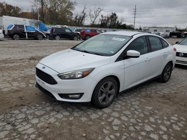FORD FOCUS SE 2018 with VIN 1FADP3FE3JL223494 - Photo from auction