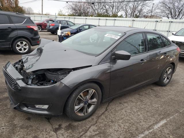 FORD FOCUS SE 2018 with VIN 1FADP3FE0JL267999 - Photo from auction