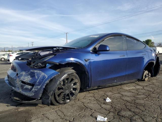 TESLA MODEL Y 2023 with VIN 7SAYGDEE4PA026882 - Photo from auction