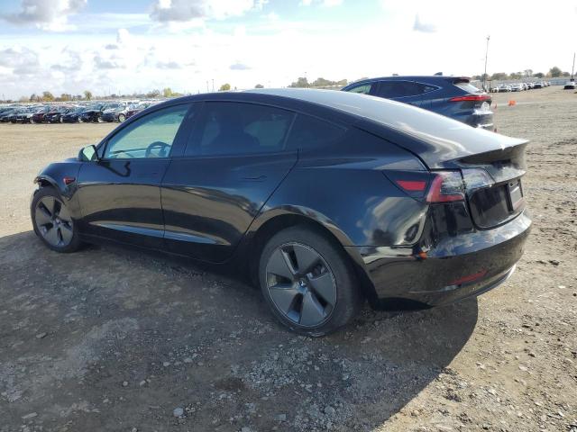 Photo 2 from auction – 2021 TESLA MODEL 3 with VIN 5YJ3E1EA5MF928786