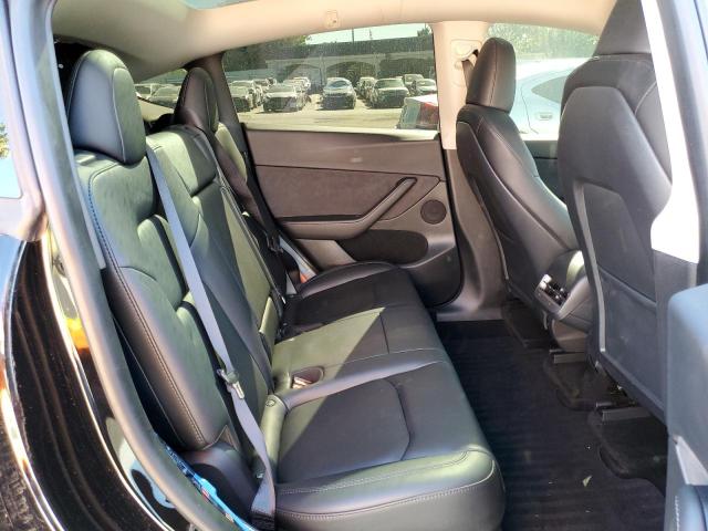 Photo 11 from auction – 2023 TESLA MODEL Y with VIN 7SAYGDEF0PF713059