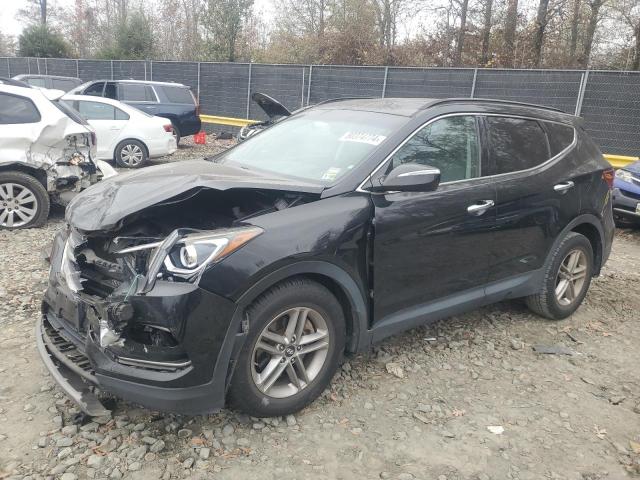 HYUNDAI SANTA FE S 2018 with VIN 5NMZU3LB1JH064169 - Photo from auction