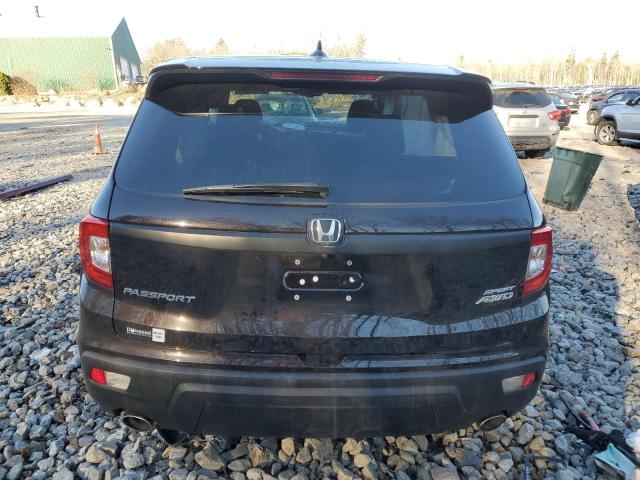 Photo 6 from auction – 2021 HONDA PASSPORT S with VIN 5FNYF8H27MB027872
