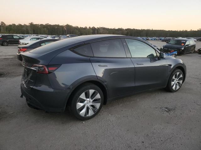 Photo 3 from auction – 2023 TESLA MODEL Y with VIN 7SAYGDEE0PA165651