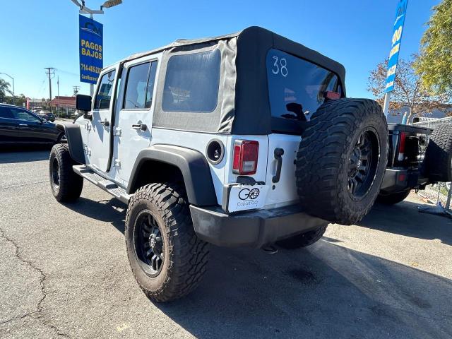 Photo 3 from auction – 2015 JEEP WRANGLER U with VIN 1C4BJWDG4FL739735