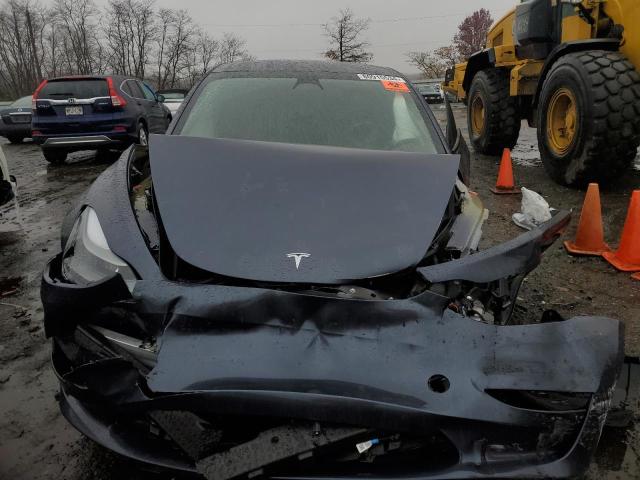 Photo 5 from auction – 2023 TESLA MODEL 3 with VIN 5YJ3E1EA7PF554427