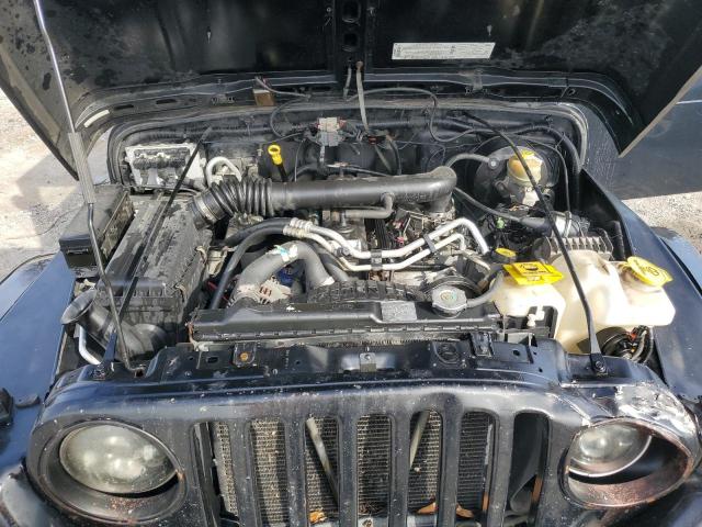Photo 11 from auction – 2003 JEEP WRANGLER C with VIN 1J4FA39S93P366008