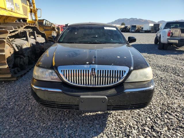 Photo 5 from auction – 2008 LINCOLN TOWN CAR E with VIN 2L1FM88WX8X634030