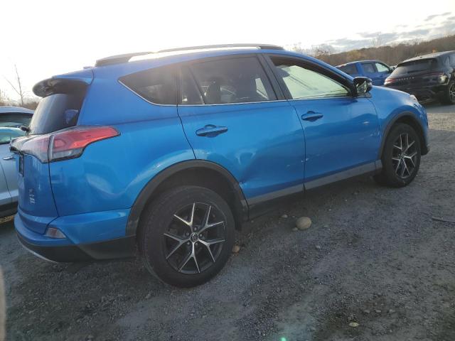 Photo 3 from auction – 2018 TOYOTA RAV4 SE with VIN JTMJFREV9JD226463