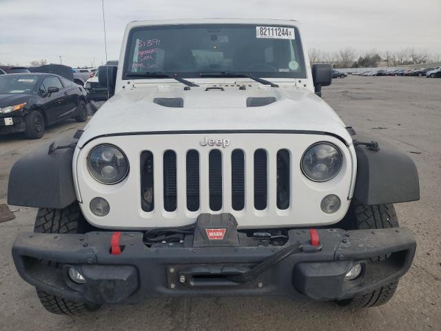 Photo 5 from auction – 2015 JEEP WRANGLER U with VIN 1C4BJWFG1FL587555