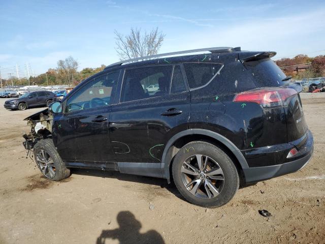 Photo 2 from auction – 2017 TOYOTA RAV4 XLE with VIN 2T3RFREV6HW679410