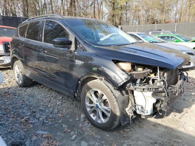 Photo 4 from auction – 2017 FORD ESCAPE SE with VIN 1FMCU0G91HUC97396