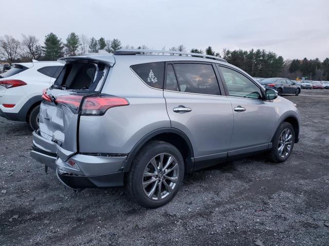 Photo 3 from auction – 2018 TOYOTA RAV4 LIMIT with VIN JTMDFREV2JD250360