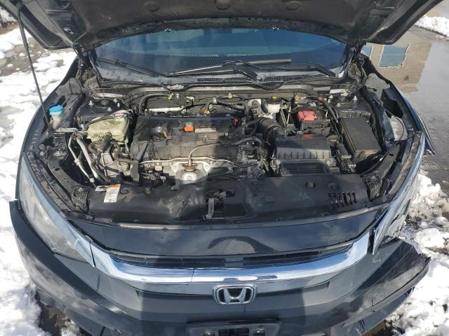 Photo 11 from auction – 2016 HONDA CIVIC EX with VIN 19XFC2F71GE244310