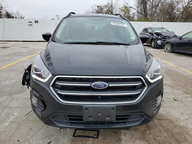 Photo 5 from auction – 2018 FORD ESCAPE SE with VIN 1FMCU0GD0JUC15958
