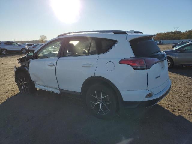 Photo 2 from auction – 2018 TOYOTA RAV4 SE with VIN JTMJFREV9JJ184796