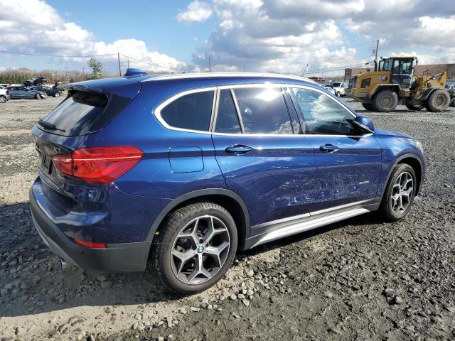 Photo 3 from auction – 2018 BMW X1 XDRIVE2 with VIN WBXHT3C38J5K21158