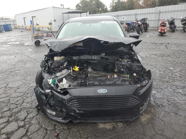 Photo 5 from auction – 2018 FORD FOCUS SE with VIN 1FADP3FE9JL249355