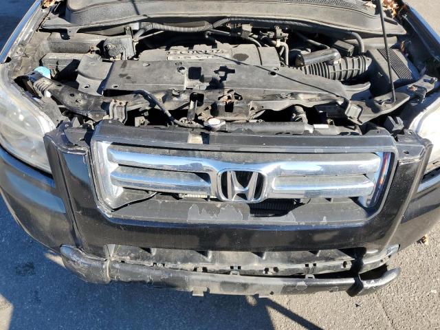 Photo 12 from auction – 2006 HONDA PILOT with VIN 2HKYF18546H513223