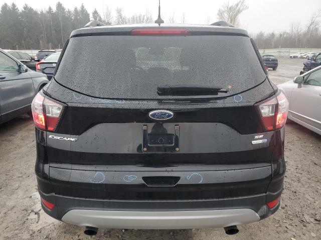 Photo 6 from auction – 2018 FORD ESCAPE SE with VIN 1FMCU9GD9JUD40638