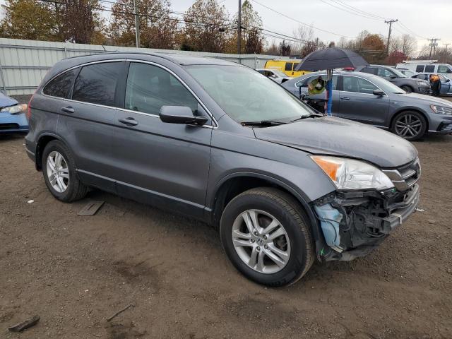 Photo 4 from auction – 2011 HONDA CR-V EXL with VIN JHLRE4H71BC030792
