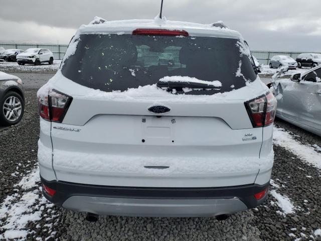 Photo 6 from auction – 2018 FORD ESCAPE SE with VIN 1FMCU9GD6JUA64953