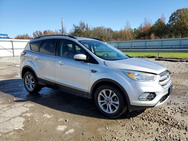 Photo 4 from auction – 2018 FORD ESCAPE SE with VIN 1FMCU0GD7JUA43587