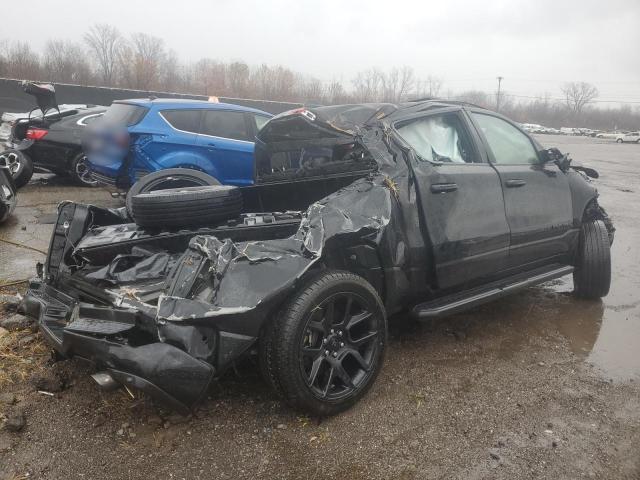 Photo 3 from auction – 2023 RAM 1500 LARAM with VIN 1C6SRFJT3PN541526