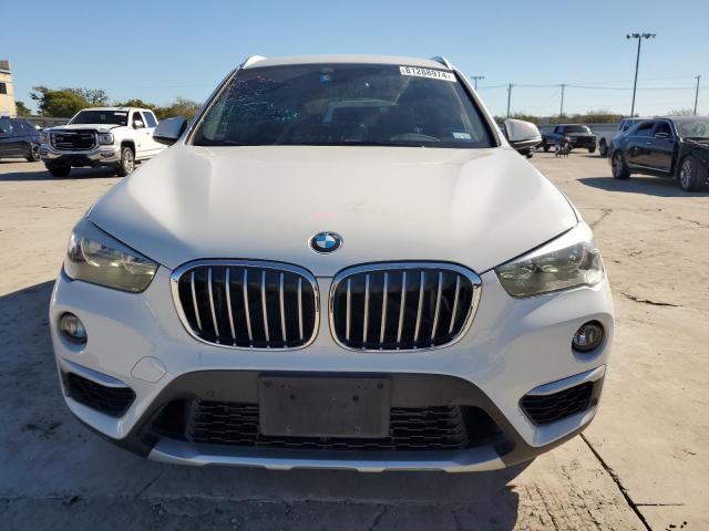 Photo 5 from auction – 2018 BMW X1 XDRIVE2 with VIN WBXHT3C3XJ5L27448