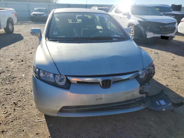 Photo 5 from auction – 2006 HONDA CIVIC HYBR with VIN JHMFA36246S016022