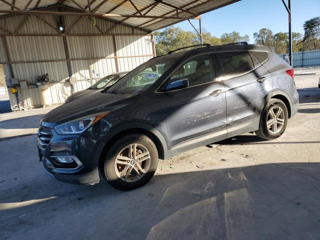 HYUNDAI SANTA FE S 2017 with VIN 5NMZU3LB0HH047583 - Photo from auction