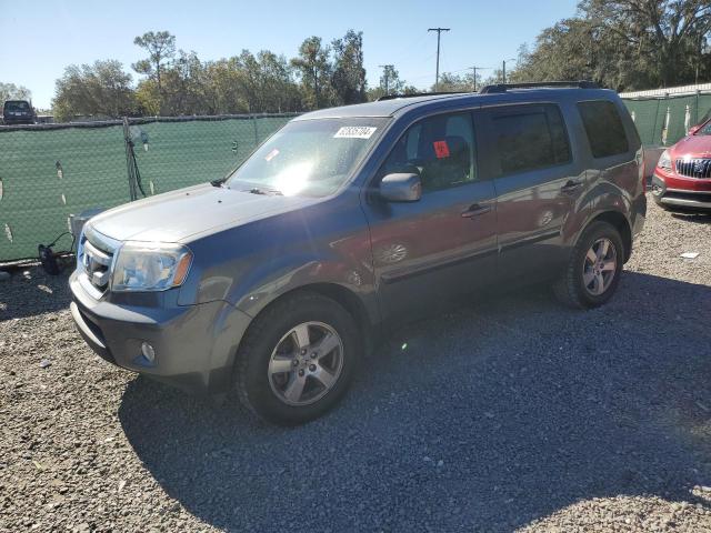 HONDA PILOT EXLN 2011 with VIN 5FNYF4H75BB101002 - Photo from auction