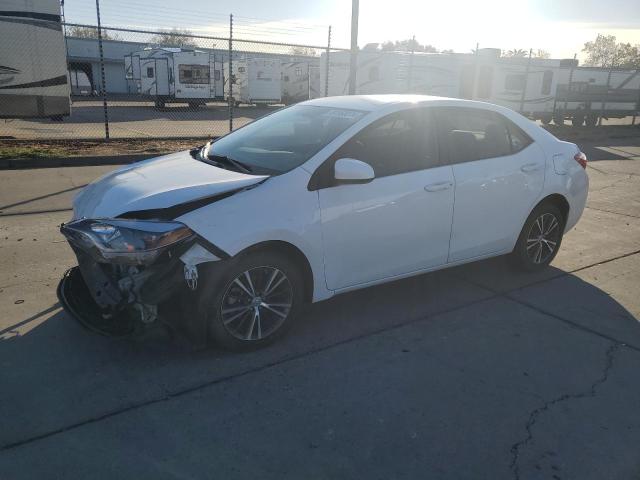 TOYOTA COROLLA L 2016 with VIN 5YFBURHE1GP506616 - Photo from auction
