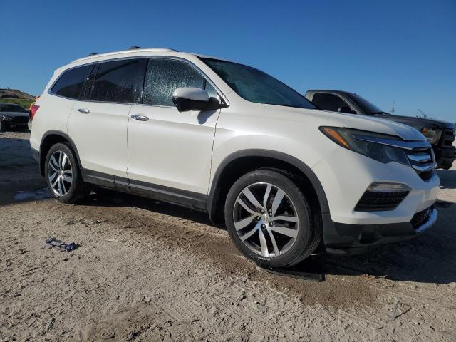 Photo 4 from auction – 2016 HONDA PILOT TOUR with VIN 5FNYF6H96GB040196
