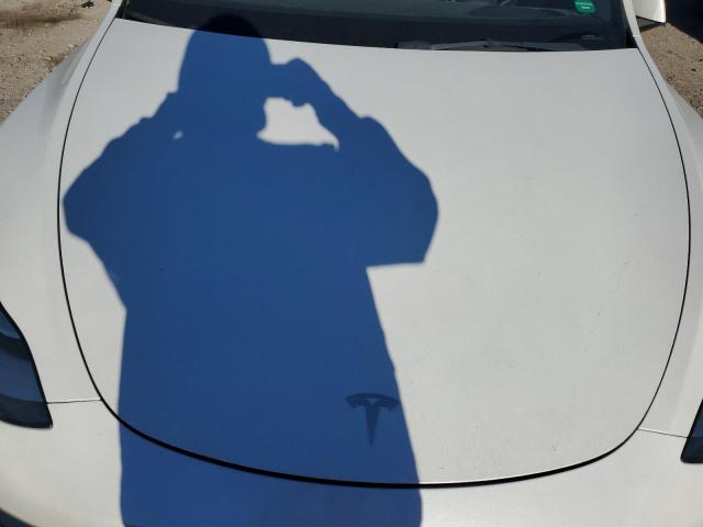 Фото 12 с аукциона – 2022 TESLA MODEL Y с VIN 7SAYGAEE6NF378392
