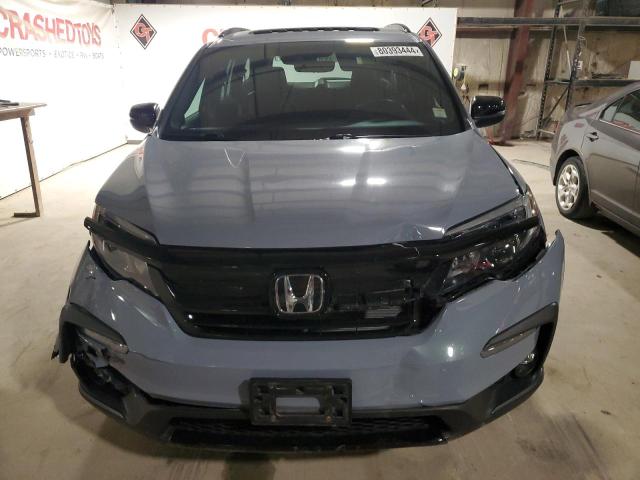 Photo 5 from auction – 2022 HONDA PILOT TRAI with VIN 5FNYF6H83NB072480