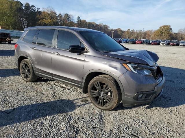 Photo 4 from auction – 2021 HONDA PASSPORT S with VIN 5FNYF7H20MB014682