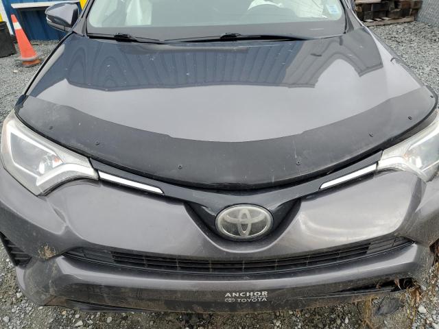 Photo 12 from auction – 2017 TOYOTA RAV4 LE with VIN 2T3BFREV0HW563279