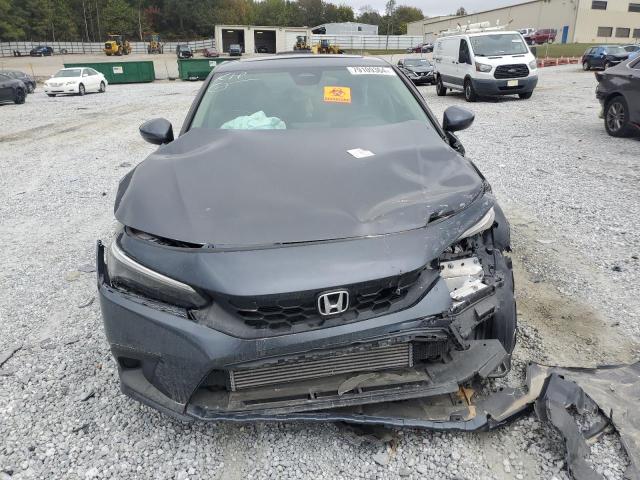 Photo 5 from auction – 2023 HONDA CIVIC EXL with VIN 19XFL1H76PE008596
