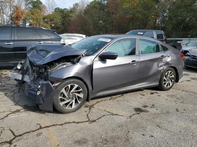 HONDA CIVIC EX 2017 with VIN 19XFC2F72HE022747 - Photo from auction