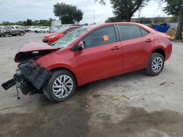 TOYOTA COROLLA L 2017 with VIN 5YFBURHE4HP696977 - Photo from auction