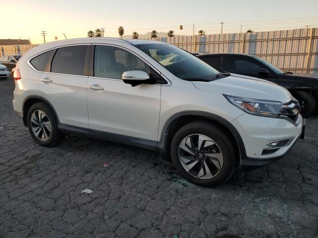 Photo 4 from auction – 2016 HONDA CR-V TOURI with VIN 5J6RM4H98GL029352