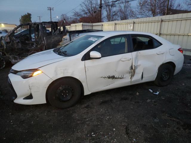 TOYOTA COROLLA L 2019 with VIN 5YFBURHE6KP922573 - Photo from auction