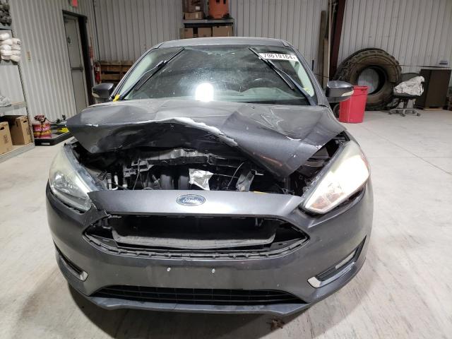 Photo 5 from auction – 2015 FORD FOCUS TITA with VIN 1FADP3J28FL228386